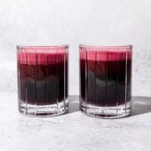 two glasses of red beet juice side by side