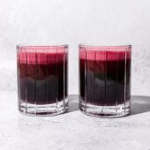 two glasses of red beet juice side by side
